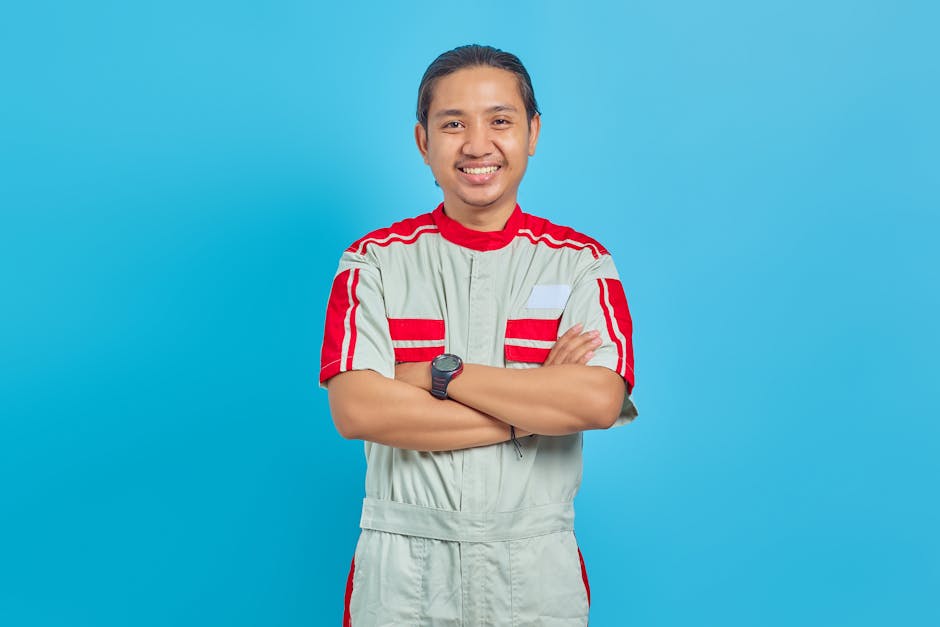 Smiling service technician ready for HVAC maintenance